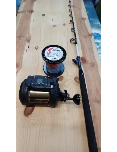 Daiwa tanacom 1200 + caña rapada + trenzado