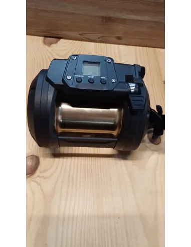 Daiwa tanacom 1200 + caña rapada + trenzado