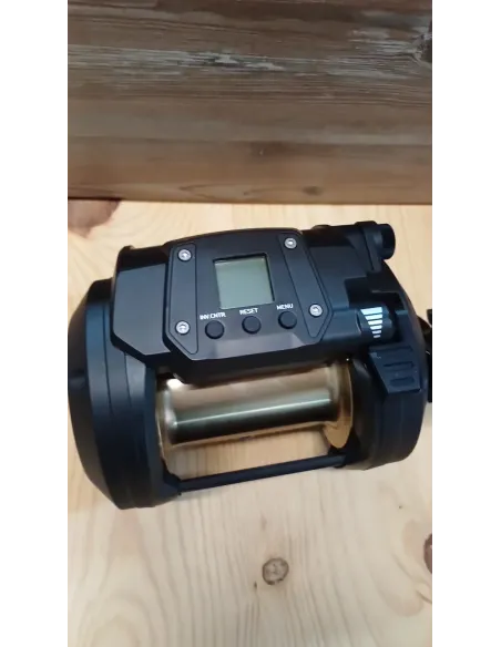 Daiwa tanacom 1200 + caña rapada + trenzado